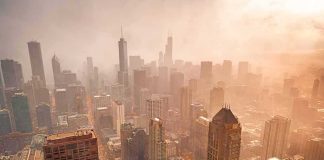 City skyline in warm haze at sunset