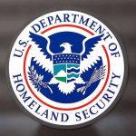 DHS Unlocks Voter Rolls — Lawsuits Explode U.S. Department of Homeland Security seal on a glass surface