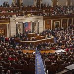 Trump Gets 100% Tariff Hammer Legislative chamber filled with attendees during a formal address