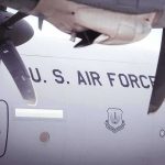 Bomb Scare Rocks U.S. Air Base military transport aircraft fuselage with propellers