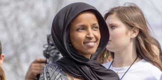 DHS Probe Shadows Ilhan Omar Ilhan Omar wearing a black headscarf at an outdoor event