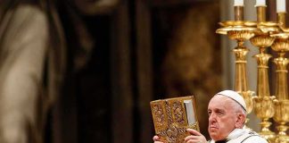 Pope Leo Health Shock: Surgery Imminent Catholic priest holds ornate book during ceremony