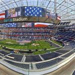 Air Force Rappel Horror at Kickoff Football stadium interior with large video board and empty seating
